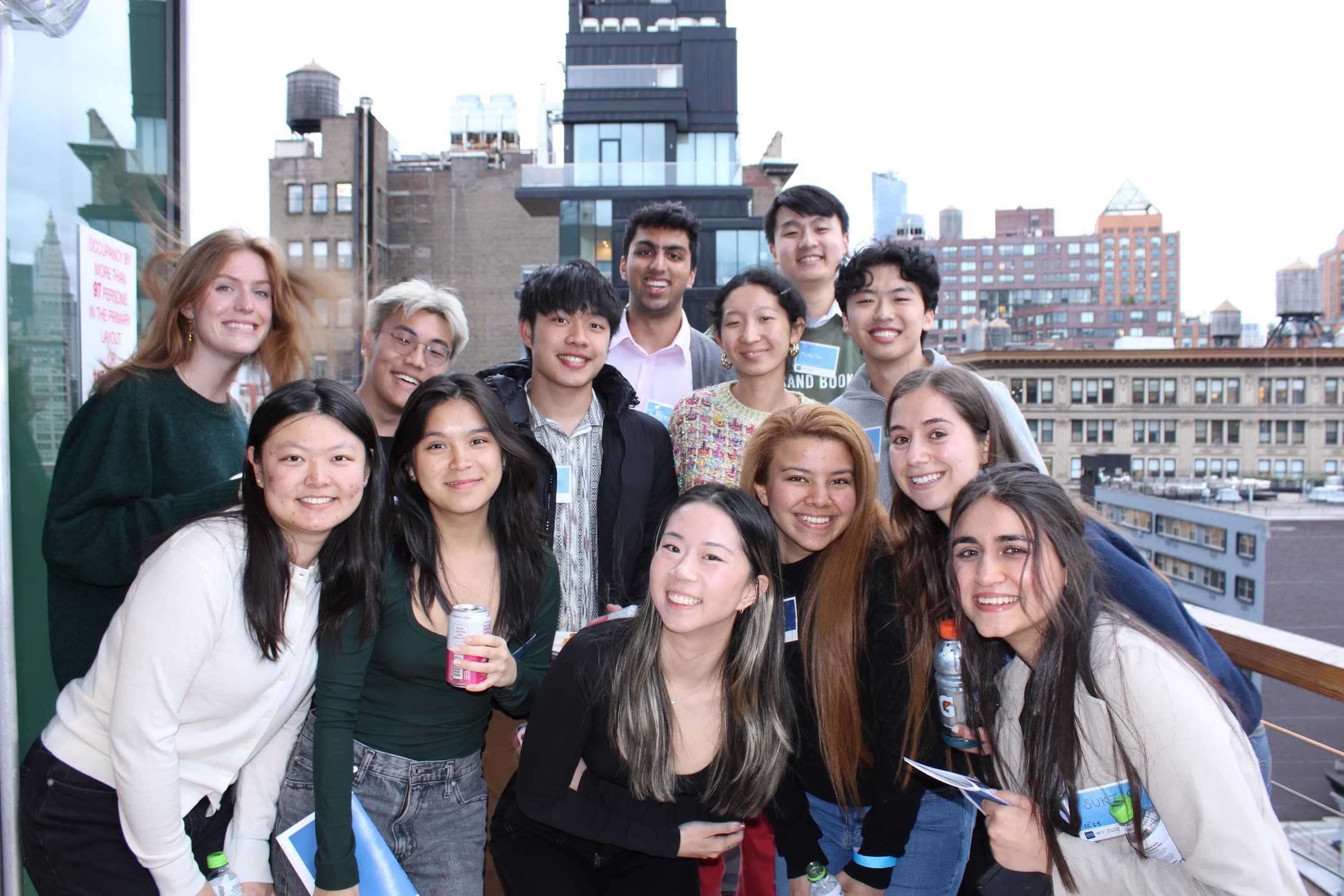 Angela with friends on a rooftop
